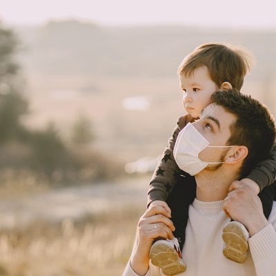 father-with-little-son-wearing-masks