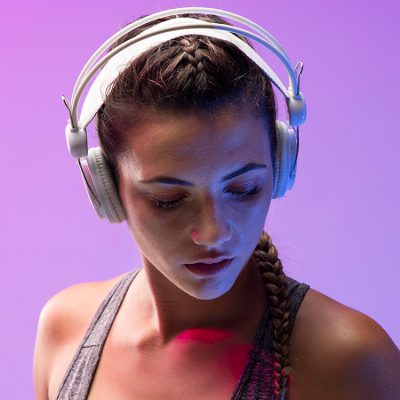 young-woman-exercising-with-her-headphones