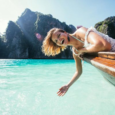 Beautiful woman making an excursion to phi phi island and maya b